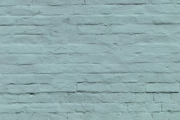  brick wall covered with blue lime