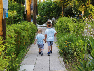 Brothers Holding Hands