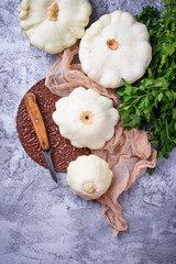 Pattypan squash on concrete background