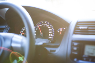 Driving car speedometer speed transportation background.