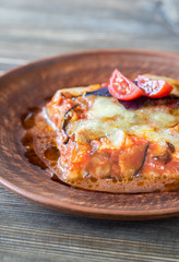 Portion of parmigiana di melanzane