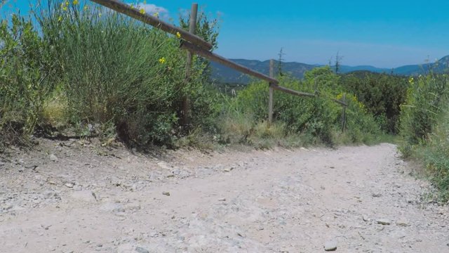 POV. point view of walking road of Chateau Queribus - one of the cathar castle in the Languedoc, France.