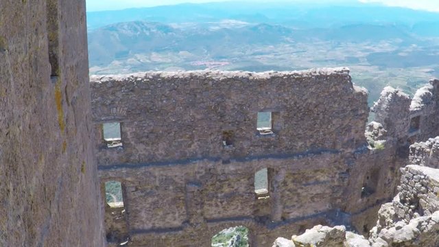 POV. point view of fragment of the wall of Chateau Queribus - one of the cathar castle in the Languedoc, France.