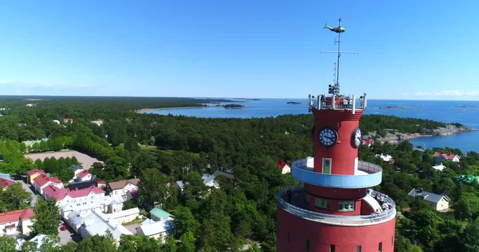 Watertower, Cinema 4k aerial view around near Hanko water tower, revealing the city, on Hango regatta day, in Uusimaa, Finland