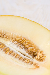 Closeup macro melon pits on the wooden board