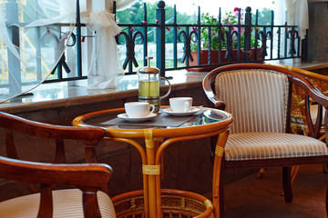  the table in a cafe with hot tea