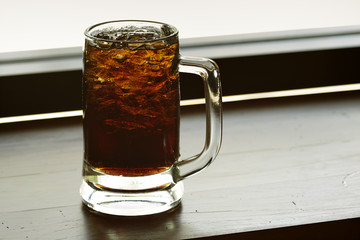 iced cola glass on the table