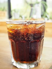 Cola with ice cubes