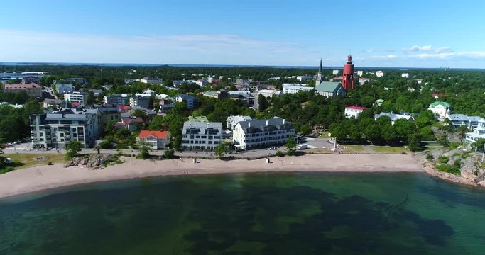 Hanko, Cinema 4k aerial view towards hanko cityscape and bulevardi beach, on Hango regatta day, in Uusimaa, Finland