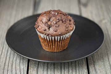 Chocolate Chip Muffin on Black Plate