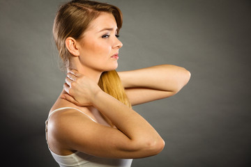 Naklejka premium Woman suffering from neck pain