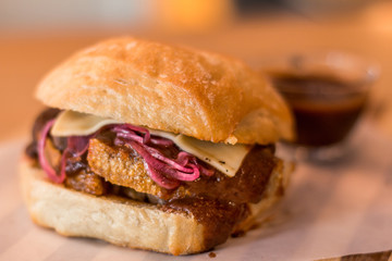 hamburguer artisan in table wood background