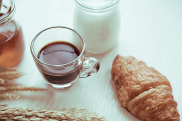 Coffee and fresh breads served for breakfast on wooden trays, a perfect way to start the day