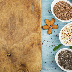 Seeds of flax, chia, quinoa: modern superfoods, healthy food ingredients, diets, breakfast. Top View.