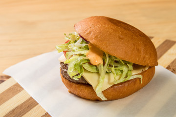 hamburguer artisan in table wood background