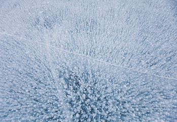 Gas bubbles texture in ice of lake.