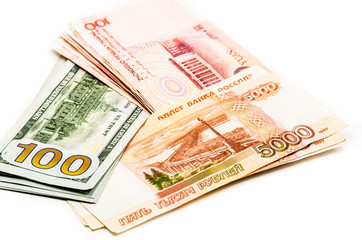 different currency banknotes. dollars, yuan and rubles on white