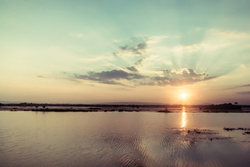 Fantastic mountain lake sunset time, vintage tone