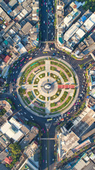 Aerial view, Road roundabout, Expressway with car lots in the city in Thailand.  beautiful Street , downtown, cityscape, Top view. Background