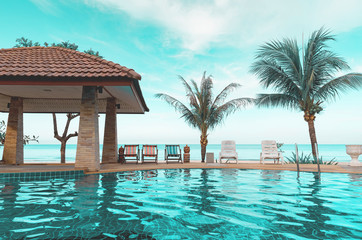 lounge chairs with swimming pool