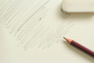 鉛筆で黒く塗りつぶしたノート