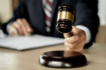 Justice and Law concept. lawyer working at courtroom, selective focus