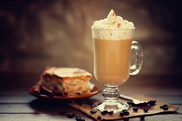 Glass of cup coffee with cream 