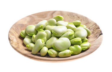 broad beans   pods and grains on an isolated white background