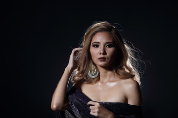 Naklejka premium Asian Blonde wave Hair Woman, Portrait open shoulders with purple glitter