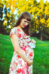 Fototapeta premium Pregnant woman in nature