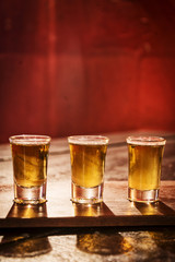 whisky shots in cozy bar interior