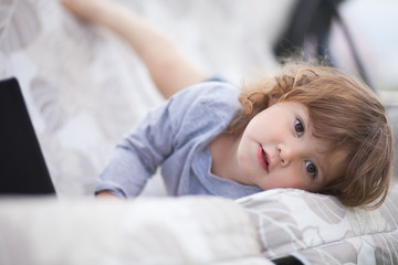 Adorable toddler girl poses like a model