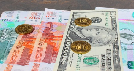 
The Russian ruble and the US dollar. Economy of two continents