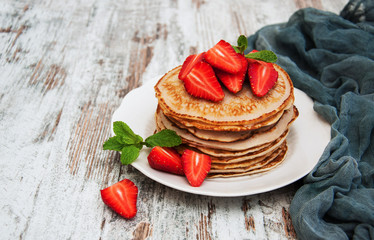 Pancakes with fresh strawberries