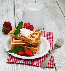 belgian waffles with strawberries and mint