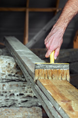 Processing of wooden beams with copper sulfate