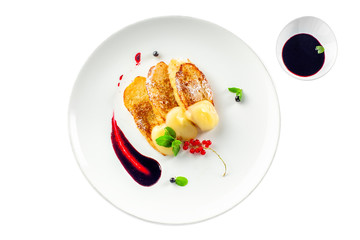 European restaurant breakfast with toasts, fruit jam, custard and fruits. Delicious healthy food.  Top view shot isolated on white background.