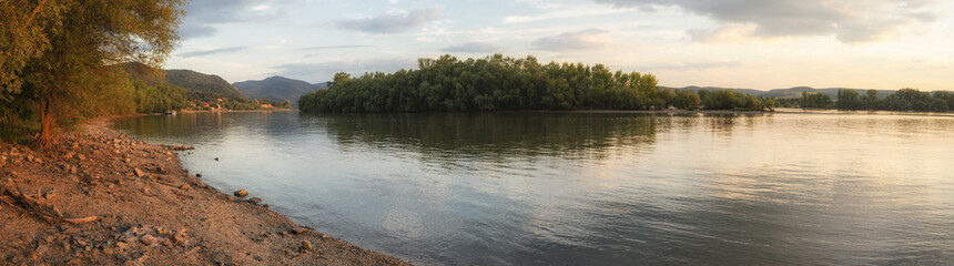 beach panorama in summer by river water