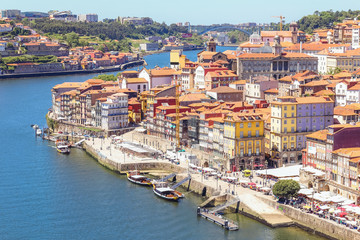 Fototapeta na wymiar Panoramic view of river Douro and the Old town of Porto with colorful houses, Portugal