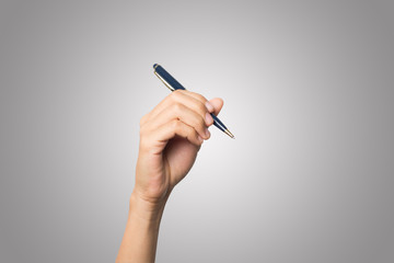 Woman hand with pens isolated on white background.