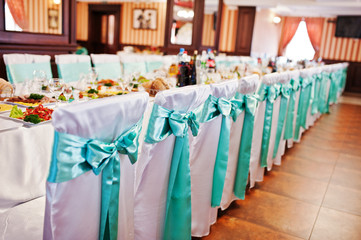 Fantastic wedding banquet table with awesome decor and delicious dishes.