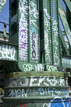 Railway bridge with graffiti at Bromley by Bow in east London. UK
