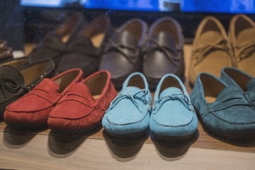 Casual men shoes in a variety of colors in a store