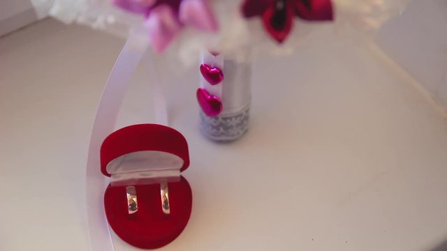 Rings newlyweds and a bride bouquet with accessories