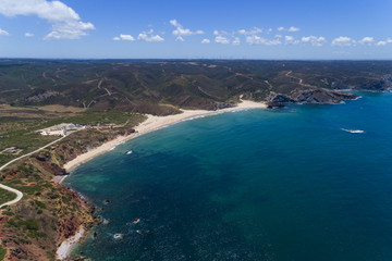 Obraz premium Aerial view of the Amado Beach (Praia do Amado) in Algarve, Portugal; Concept for travel in Portugal
