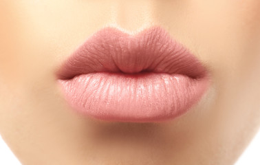 Young woman with natural lips makeup, closeup