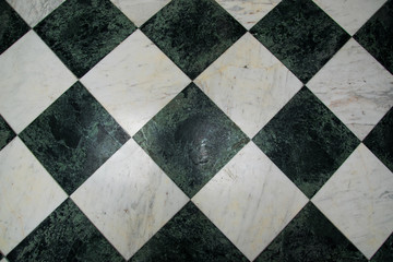 Green and white checkered marble floor pattern