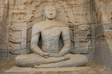 Rock carved buddha image in gal vithara rock temple in sri lanka