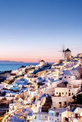 Beautiful sunset on the island of Santorini, Greece. A view of the village of Oia.