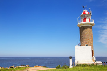 Fototapeta na wymiar Punta Brava lighthouse in Punta Carretas, Montevideo, Uruguay